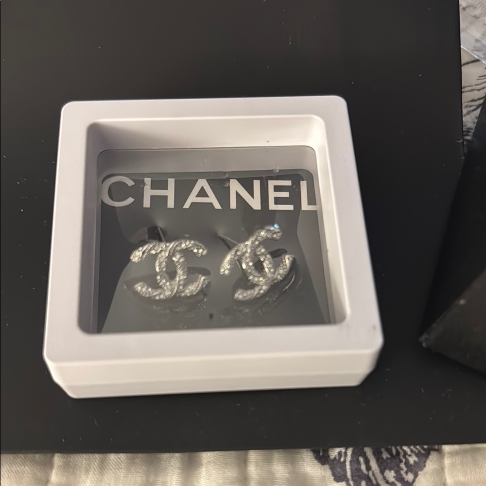 Chanel Silver Interlocking Cc Logo Earrings - image 1